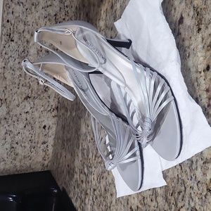 Silver ankle strap high heels in size 9M